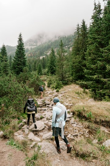 Two hikers on a rocky mountain trail